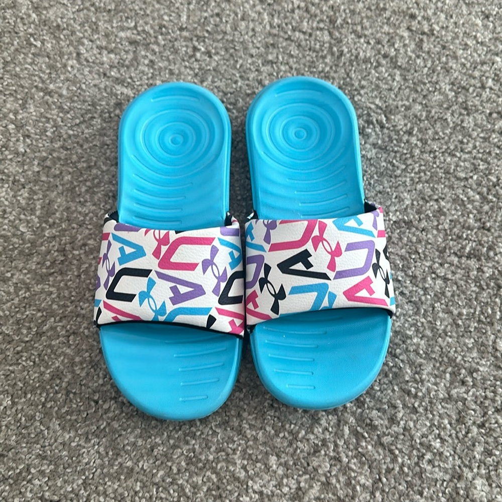 Little girl Under Armor slides